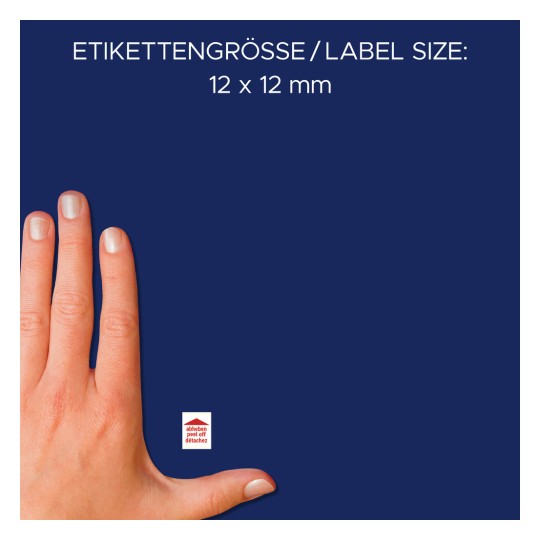 A kép egy gondosan manikűrözött ujjakat mutató kezet ábrázol, amely egy kis címke mellett van elhelyezve. A címke mérete 12 x 12 mm, és német, valamint francia nyelvű utasítások kísérik.