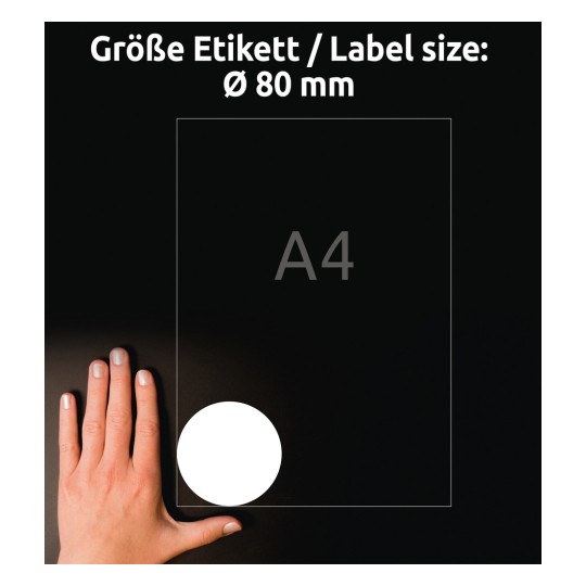 A kép egy kézfejet mutat, amely egy A4-es méretű papírlap mellett helyezkedik el, egy Ø 80 mm-es jelölésű kör alakú címkével.