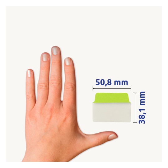 A képen egy manikűrözött körmökkel rendelkező kéz látható, egy fehér tárgy mellett, amelynek zöld teteje van, valamint a méretei 50,8 mm és 38,1 mm.