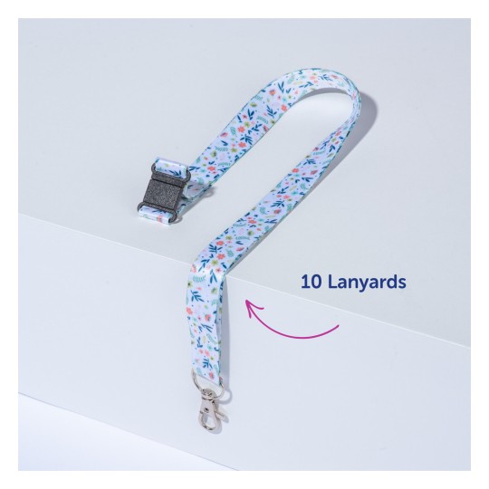 A kép egy színes, virágmintás zsinórt ábrázol, amelyen egy csat található. Egy sík felületen van elhelyezve, a címke pedig azt jelzi: '10 Lanyard'.
