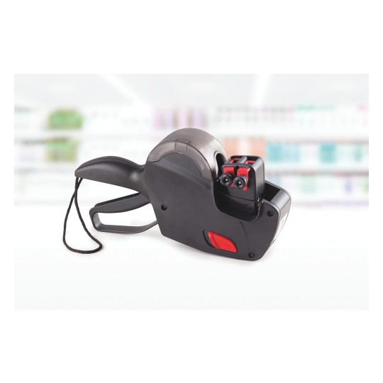 The image shows a handheld label maker with a black body and red accents. It has a roller for labels and a trigger mechanism for printing. The background appears blurred, suggesting a store environment.