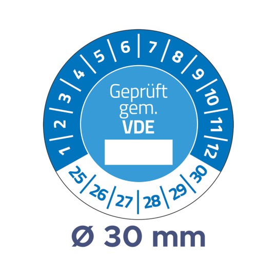 A képen egy kerek mérőeszköz vagy címke látható kék és fehér mintával. A közepén a „Geprüft gem. VDE” szöveg található, amelyet 1-től 30-ig számozott jelölések vesznek körül. A címke továbbá egy 'Ø 30 mm' átmérőt is jelez.