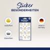 A kép egy matricalapot mutat be, amely különféle katicabogár dizájnokat tartalmaz arany- és ezüsthatásokkal, "Design Sticker" felirattal. Megemlíti, hogy a termék Németországban készült.