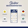 A kép egy matricás ívet ábrázol, amelyen arany és ezüst katicabogár minták találhatók. Kiemeli a 'különleges jellemzőket', mint a 'arany hatás', 'ezüst hatás', és információkat, amelyek szerint a terméket Németországban gyártották fenntartható csomagolással.