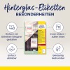 A képen az Avery 'Hinterglas-Etiketten' termékcsomagja látható, kiemelve annak tulajdonságait, mint például az egyszerű tervezés szerkesztővel, az eltávolítható tapadás és a kétoldalas nyomtatási képesség. Tartalmazza a címkék elhelyezésére vonatkozó utasításokat, hogy kívülről olvashatóak legyenek.