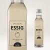 A képen egy üveg alma balzsamecet látható. A címke azt jelzi, hogy 100%-ban almából készült, bio, és 250 ml-t tartalmaz. A márkanév Junge Küche.