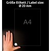 A kép egy A4-es méretű átlátszó lapot mutat, amely mellett egy kéz helyezkedik el. A címke felirata 20 mm átmérőjű címkeméretet jelöl.