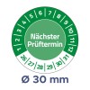 A képen egy kör alakú naptár látható, amely a következő ellenőrzési dátumot jelzi, "Nächster Prüftermin" felirattal, dátumokat jelölő számokkal körülvéve, 30 mm-es átmérővel megadva.